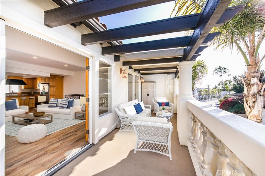 Beautiful South Hermosa Beach townhome, just 5 minutes from the sand! Welcome to this spacious 3 bedroom, 3 1/2 bathroom townhome offering almost 2,100sq ft of coastal living in one of Hermosa Beach’s most desirable neighborhoods. Built in 2001, the home was recently updated with fresh interior paint and new flooring. This home combines modern comfort with timeless beachside style with a touch of luxury. The open-concept floor plan features a bright living room with high ceilings, recessed lighting, and access to a large deck for seamless indoor-outdoor living. The gourmet kitchen is equipped with stainless steel appliances, granite countertops, and a breakfast bar — perfect for entertaining and everyday meals. Relax and take in panoramic neighborhood and ocean views from the private rooftop deck or unwind on the spacious deck off the living room. All bedrooms are located on the same floor, and a separate laundry room with washer and dryer, extra storage, and a two-car attached garage, adds everyday convenience. Located just a short walk to The Strand, the greenbelt, Hermosa Beach parks, shopping, dining, and award-winning Hermosa Beach schools, this home offers the best of South Bay living. Don’t miss this rare opportunity to live the California beach life dream—homes in this prime location do not last long! (Note. One or more of the property photo(s) was virtually staged.)