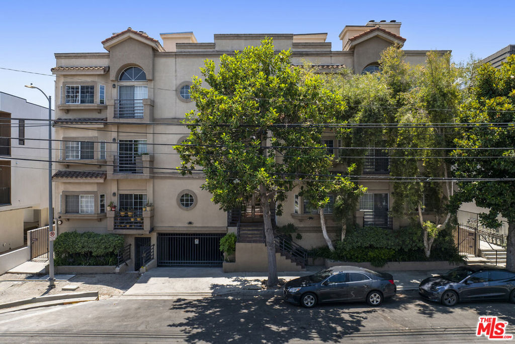 Looking for value that's a step up, too? Find it here in almost 1,700 square feet of expansive, move-in ready living space that's sure to check your "must-have" boxes. For example: 2 bedrooms, including a primary suite with its own balcony, walk-in closet and mirrored wardrobe; 2.5 baths; a multi-purpose room for an office, den or the TV with its own balcony; soaring ceilings that surprise and delight; a wood-burning/gas fireplace; an eat-in kitchen, plus a special-occasion, raised dining area; updates throughout punctuate the open-plan with its maple flooring. There's a wet bar and an in-unit stair that leads to a private roof deck with sweeping views to the hills. Enter the subterranean garage with two side-by-side spaces. Take the elevator to this top-floor penthouse with its warm, southern exposure, minimal common wallsand quiet. The affordable HOA dues at this 10-unit building include earthquake insurance, too. A tour while it lasts is easy to arrange.