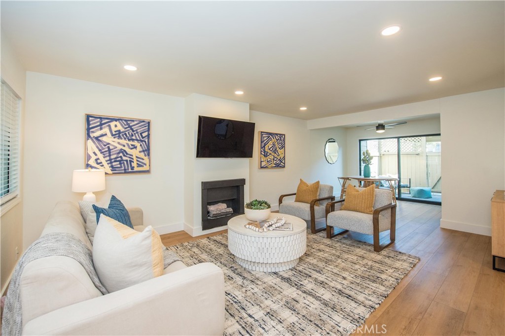 Discover the charm of this exquisite end-unit townhome at 9 Sundance, nestled in the serene Newport Terrace community of Newport Beach, California. Spanning approximately 1,129 square feet, this thoughtfully designed 3-bedroom, 2.5-bathroom home offers a perfect blend of modern comfort and coastal elegance, making it an ideal retreat for those seeking a vibrant yet tranquil lifestyle.
Step inside to a bright and inviting interior, where the generous Master Suite stands out with its soaring vaulted ceilings, creating a spacious and airy ambiance. The suite features a custom built-in closet, providing ample storage tailored to your needs. The open-concept living area is perfect for both relaxation and entertaining, highlighted by a cozy fireplace that adds warmth and character. Adjacent to the living room, the dining area flows seamlessly, enhancing the home’s welcoming vibe.
A true highlight is the private patio, accessible directly from the living space, offering a serene spot for morning coffee, outdoor dining, or quiet evenings under the stars. With direct garage access, convenience and security are effortlessly integrated into your daily routine. This home is meticulously maintained, presenting as beautifully in person as it does in photos, ready for you to move in and make it your own.
As part of the Newport Terrace community, you’ll enjoy access to exceptional amenities, including two sparkling pools, a relaxing hot tub, a sport court, and well-equipped BBQ and picnic areas—perfect for gatherings with friends and neighbors. The community is a hidden gem, surrounded by natural beauty, with wooded trails, Canyon Park, Talbert Reserve, and Marina View Park just steps away. For beach lovers, the Santa Ana River Trail offers a scenic route to Newport Beach’s iconic shores.
Embrace the best of Newport Beach living at 9 Sundance, where modern comforts, community amenities, and proximity to nature and the beach create an unparalleled lifestyle. Don’t miss this opportunity to own a slice of coastal paradise!