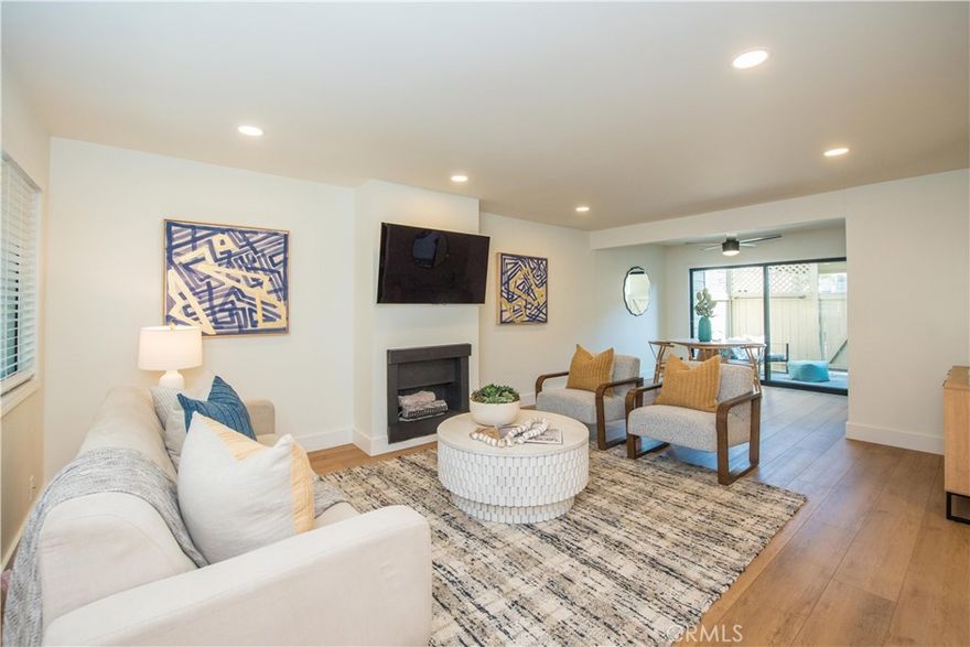 Discover the charm of this exquisite end-unit townhome at 9 Sundance, nestled in the serene Newport Terrace community of Newport Beach, California. Spanning approximately 1,129 square feet, this thoughtfully designed 3-bedroom, 2.5-bathroom home offers a perfect blend of modern comfort and coastal elegance, making it an ideal retreat for those seeking a vibrant yet tranquil lifestyle.



Step inside to a bright and inviting interior, where the generous Master Suite stands out with its soaring vaulted ceilings, creating a spacious and airy ambiance. The suite features a custom built-in closet, providing ample storage tailored to your needs. The open-concept living area is perfect for both relaxation and entertaining, highlighted by a cozy fireplace that adds warmth and character. Adjacent to the living room, the dining area flows seamlessly, enhancing the home’s welcoming vibe.



A true highlight is the private patio, accessible directly from the living space, offering a serene spot for morning coffee, outdoor dining, or quiet evenings under the stars. With direct garage access, convenience and security are effortlessly integrated into your daily routine. This home is meticulously maintained, presenting as beautifully in person as it does in photos, ready for you to move in and make it your own.



As part of the Newport Terrace community, you’ll enjoy access to exceptional amenities, including two sparkling pools, a relaxing hot tub, a sport court, and well-equipped BBQ and picnic areas—perfect for gatherings with friends and neighbors. The community is a hidden gem, surrounded by natural beauty, with wooded trails, Canyon Park, Talbert Reserve, and Marina View Park just steps away. For beach lovers, the Santa Ana River Trail offers a scenic route to Newport Beach’s iconic shores.



Embrace the best of Newport Beach living at 9 Sundance, where modern comforts, community amenities, and proximity to nature and the beach create an unparalleled lifestyle. Don’t miss this opportunity to own a slice of coastal paradise!
