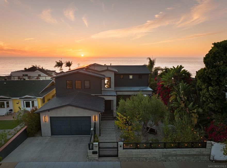 Elevated luxury in Sunset Cliffs. This custom coastal modern offers an exceptional blend of style and comfort, designed to meet the highest standards of living. Step inside to discover an open concept that beautifully frames the Pacific Ocean, allowing you to enjoy daily white water views and the soothing sound of ocean waves from multiple living areas. With 4,016 square feet of living space, this home features 5 generously sized bedrooms and 7 beautifully designed bathrooms. The flexible layout includes two primary suites, one of which has its own laundry. High ceilings and an abundance of natural light enhance the home's soothing atmosphere. Stunning chef's kitchen equipped with high-end appliances and a generous walk-in pantry. Designed for both intimate gatherings and grand entertaining, this kitchen provides the perfect setting for culinary creativity and socializing. The flex room is ideal for exercise, yoga, or meditation, and is highlighted by an expansive freshwater fish tank filled with exotic fish. This provides a tranquil backdrop as it overlooks the beautifully landscaped and serene front yard which features a Renu cold plunge and barrel sauna. Perfect for entertaining, the home includes multiple view decks extending from the living areas creating a natural indoor outdoor flow. Relax and refresh in the Modpool with swim jet surrounded by a custom built deck that perfectly transitions from the entertaining deck. A large bbq island with seating, an outdoor fire pit, Bullfrog spa, and direct alley access highlight this stunning backyard.  Additional features include solar, an elevator for convenience, two laundry rooms, Aquasauna whole house water filtration system, custom architectural stair railing, professionally designed landscaping, beautiful ambient lighting throughout, finished two car garage, and a private security gate.  Easily indulge in beachside strolls, bike rides and hikes along the scenic pathways of Sunset Cliffs. Experience luxury living at its finest at 758 Cordova Street, where every detail is crafted to offer a truly exceptional lifestyle.