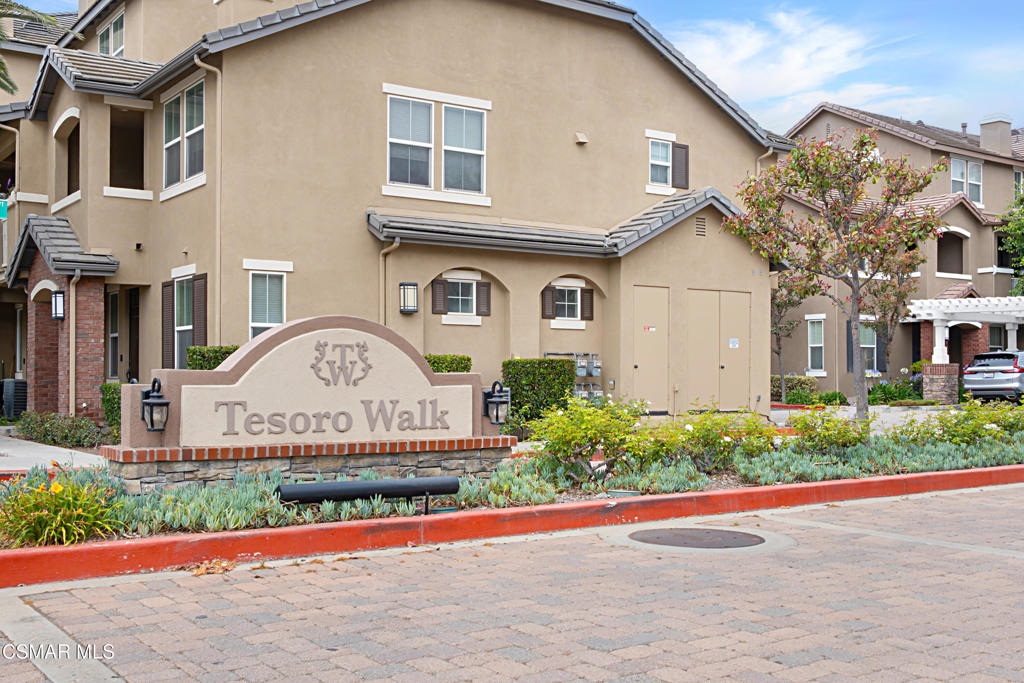 Welcome home to this stunning condo in the beautiful townhome community of Tesoro Walk. Located in the highly desirable Mission Oaks area of Camarillo, this property offers the most extensive floor plan available. The heart of the home lies on the second level, where the open-concept living area is anchored by a cozy fireplace, inviting you to relax in style. A charming balcony porch is ideal for enjoying your morning coffee or quiet evenings outdoors. With an open floor plan, three bedrooms, and Three and a half bathrooms, a walk-in closet, direct access to a 2-car garage, updated bathrooms, a laundry area, and a chef's kitchen with designer tiles and backsplash, stainless steel appliances, a center island, recessed lighting, and ample cabinet space. The residence is bright and airy, with numerous windows that allow for natural light. The neighborhood is very family-friendly with its own community swimming pool, clubhouse, and gym. Additionally, there is a vast lawn area, perfect for walking dogs and children to play. There is a pathway from this grassy area that leads to the community playground. Easy freeway access, this lovely townhome is waiting for you, and the community is FHA/VA approved. Schedule an appointment today!