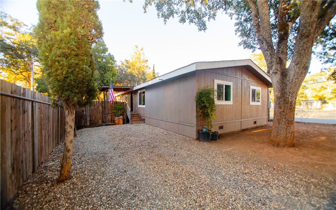 Welcome to this semi-modern manufactured home offering 3 bedrooms and 2 bathrooms, perfectly blending comfort and convenience. Step inside to a spacious open-concept kitchen and living area, ideal for gatherings and everyday living. The primary suite features a relaxing soaking tub and a separate shower for a spa-like retreat. Recent updates include a roof installed in 2018, newer double-pane windows, and a modern mini-split system providing efficient heating and cooling. Located close to downtown, shopping, restaurants, medical clinics, and highway access for an easy commute, this home also places you near the crown jewel of Lake County—Clear Lake, California’s oldest natural lake, renowned for its year-round world-class fishing and recreation. A perfect mix of style, updates, and location awaits you here.