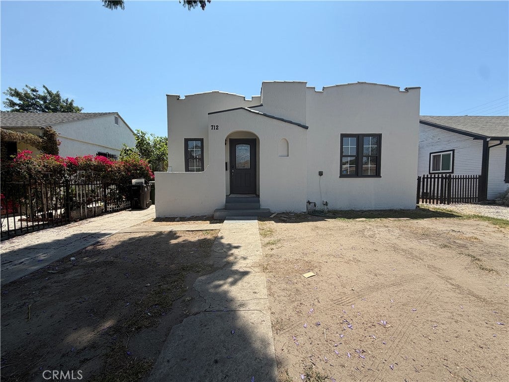 Photo of 712 E 82nd ST, Los Angeles, CA 90001 (MLS # IV26171444)