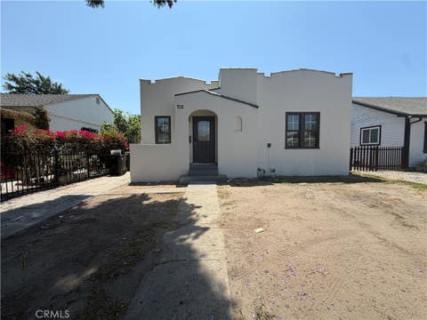 Photo of 712 E 82nd ST, Los Angeles, CA 90001 (MLS # IV26171444)