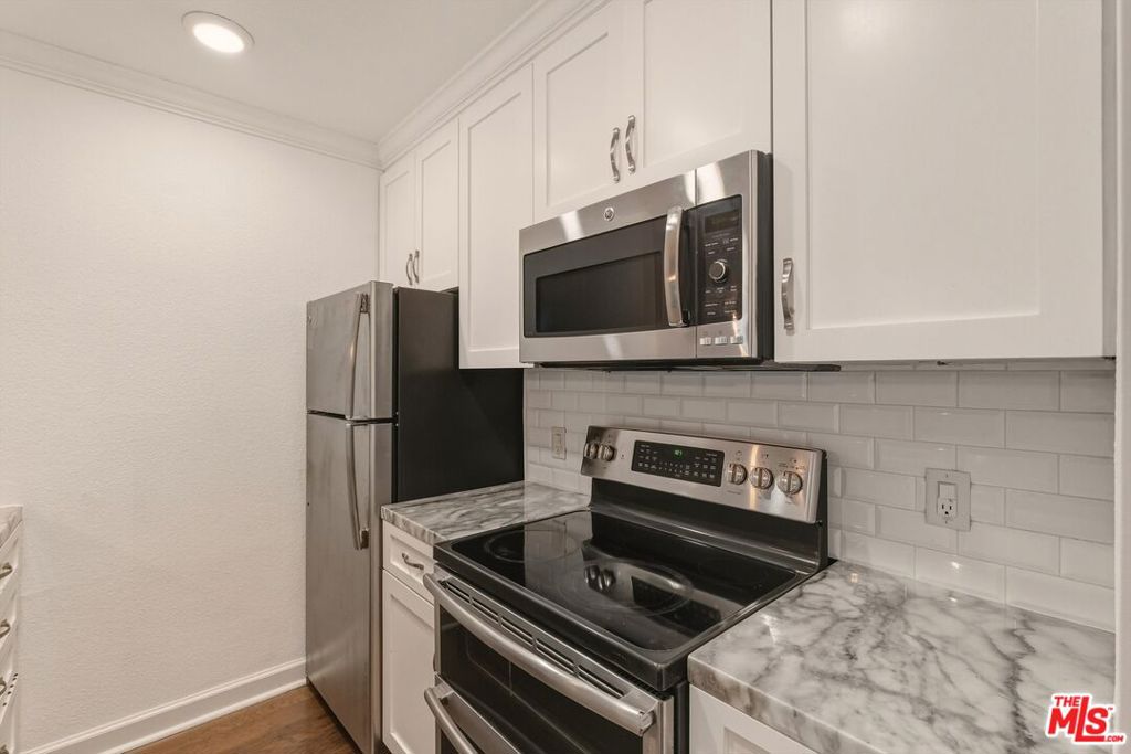 141 S Clark Drive 225