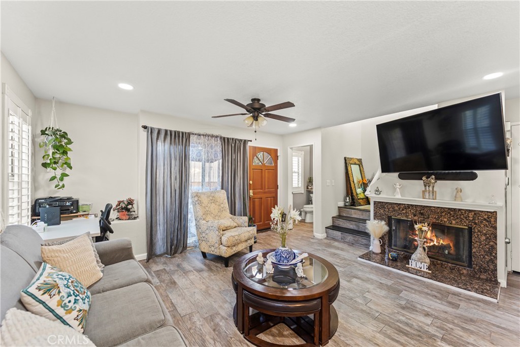 Welcome to this beautifully updated end-unit townhome in the highly desirable Mountain View Villas community. Offering 3 bedrooms, 3 bathrooms, and 1,333 sq. ft. of comfortable living space, this home shares only one common wall for added privacy and enjoys abundant natural light from large windows. The spacious living room features a cozy gas fireplace and flows seamlessly into the dining area, while the upgraded kitchen is complete with granite countertops, stainless steel appliances, and ample cabinetry.
Upstairs, the oversized primary suite boasts soaring ceilings, a walk-in closet, and a spa-like bathroom with dual sinks and granite counters. Two additional bedrooms provide the perfect space for family, guests, or a home office. Additional highlights include a private patio ideal for entertaining, and an attached 2-car garage with storage and laundry hookups.
Residents of Mountain View Villas enjoy access to a sparkling community pool—perfect for warm summer days. FHA approved, this home is move-in ready and waiting for you!