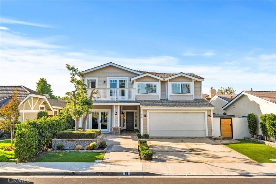 Welcome to 38 Ashwood, a beautifully remodeled 5-bedroom, 4-bath residence with a spacious loft spanning over 3,100 square feet with upgraded living spaces—one of the largest homes in this sought-after Irvine community.



Step inside to find fresh paint throughout, elegant finishes, natural travertine floors in a custom Versailles pattern, and an open-concept floor plan designed for both comfort and style. The stunning kitchen features modern cabinetry, sleek countertops, and premium appliances, flowing effortlessly into the dining and living areas with a stunning gas fireplace—perfect for entertaining or everyday living. Each bathroom has been thoughtfully updated with sophisticated touches, and ceiling fans in the bedrooms add year-round comfort alongside central A/C.



Upstairs, the generous loft with custom built-ins provides the ideal flex space for a home office, media room, or play area. Included is also a private balcony overlooking a peaceful park—an inviting spot to enjoy your morning coffee or unwind in the evening.



The backyard is an entertainer’s dream, featuring a private jacuzzi, gas fire-pit, outdoor fireplace, shuffleboard deck, covered patio, and lush turf in both the front and back yards. Whether you’re hosting friends or relaxing after a long day, this outdoor space truly has it all.



As part of the incredible community amenities, you’ll enjoy access to two landmark lakes with docks, two beach lagoons, 22 pools, 16 spas, 13 waders, 23 tennis courts, four pickle-ball courts, a splash pad, parks, volleyball courts, a big wheel park, horseshoe and shuffleboard areas, an outdoor fitness course, basketball, bocce ball, and so much more—all just minutes away.