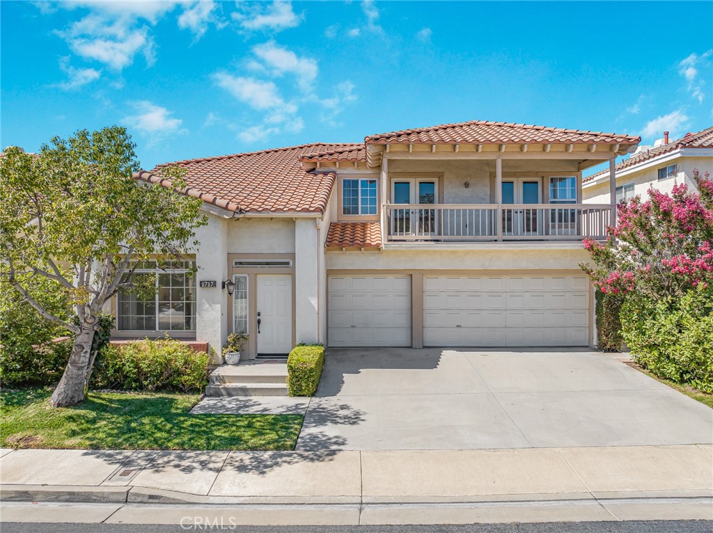 Welcome to this spacious and stunning home located in the desirable and serene El Dorado gated community! This beautiful community house built in 1990, house is Facing South ,2803 sq/ft living space with 4 bedrooms, 3 full bathrooms and 3- car attached garage. And a large bonus room that could be 5 bedroom with a balcony. 2 rooms with a large balcony view the street Super open floor plan with high vaulted ceilings and lots of natural light. Stylish living room is connected to the spacious formal dining room. The semicircular staircase leads to the second floor, offering view of the spectacular high ceilings and the living room and dining room. Open and bright kitchen with a good-side nook area. the family room features a cozy fireplace and offers views of the backyard. One bedroom and one full bathroom downstairs. Hue and bright master bedroom with double-side fireplace, standing shower, soaking tub, double sinks, and a walk-in-closet. Enjoy relaxing tea time and al fresco meals in the spacious backyard with your family under a beautiful patio. The community offers and spa, BBQ and plenty of guest parking with low HOA $180 monthly fee. Kept home in very good maintenance. Convenient location.