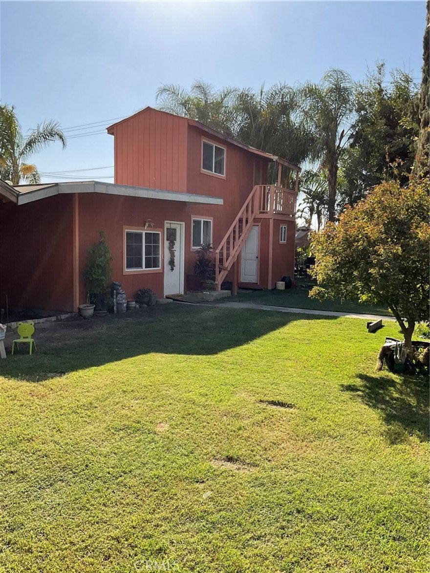 Holy cow!   So much potential!   Older Home in need of updating/repairs.  Converted garage into a 1 Bedroom, 1 bathroom apartment with its own entrance - no permits.  Lots of trees, and lush vegetation that may make you feel you are in your own paradise.  Large Corner Lot!    Come.   Fall in Love.   Present your Offer!