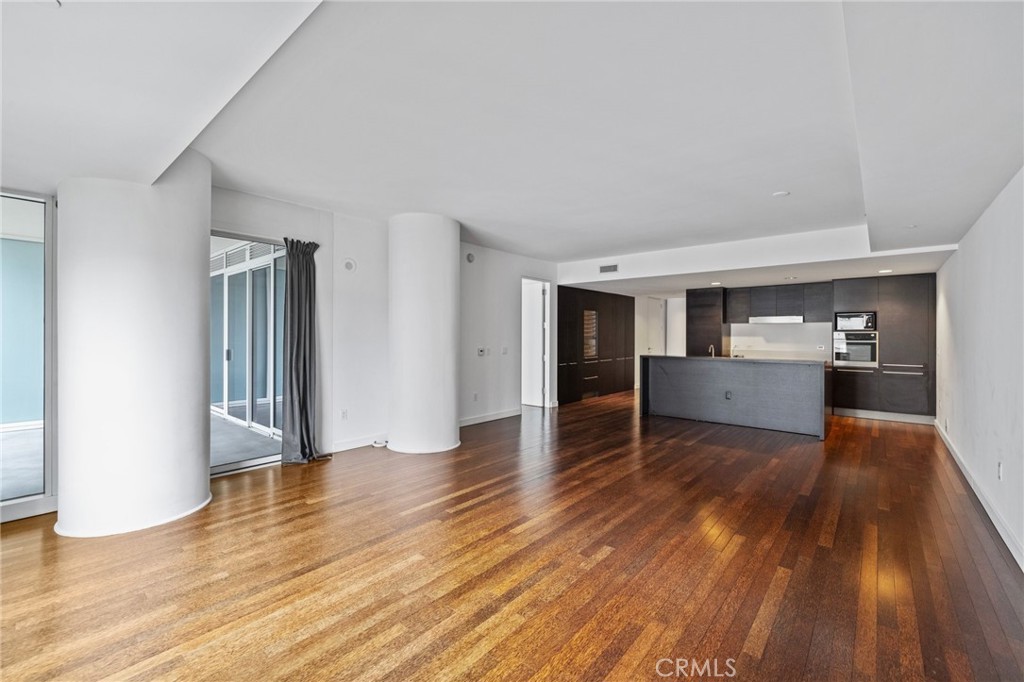 Experience breathtaking views and unparalleled luxury in this exquisite residence, nestled above the vibrant heart of New Hollywood.
The European-style kitchen, boasting Sub-Zero, Kuppersbusch, and other premium appliances, presides over an architectural living/dining space that flows onto a large, furnished terrace adjoining the master suite. A versatile second bedroom/office includes a Murphy bed and full bath access. Enjoy elegant hardwood floors and the convenience of an in-unit washer/dryer in this Silver LEED certified building.
Premier Amenities & Location!
The W Residences offer full-service luxury:
Exclusive, private 24-hour valet and concierge
Spectacular $1M rooftop enhancements, including a fitness center and pet park
Private residential movie theater
Benefit from two secure garage parking spaces and signature W "Whatever/Whenever" service. Plus, direct access to the Metro Red Line puts all of LA at your fingertips.
This is the ultimate in Hollywood luxury and convenience.