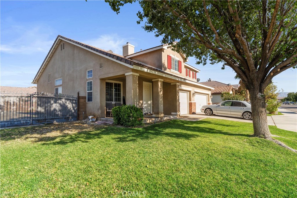 This appealing two-story home offers both functionality and future flexibility! Situated on an expansive 9,500+ sq ft lot, this property includes **RV access with an iron gate**, extended paved concrete in the backyard, and a block wall for added privacy and peace of mind.
Inside, you'll find an updated kitchen with modern countertops and ample storage, a spacious family room and a generous laundry room — perfect for busy households. Ceiling fans throughout help circulate cool air from the **NEW dual HVAC system**, while **PAID solar panels** help keep energy costs low all summer long. The updated water heater adds further value and efficiency.
Upstairs, the Primary bedroom has a large walk in closet you have to see to believe and enjoy 3 more well-proportioned bedrooms for a 3,000+ sq ft home. Downstairs, a convenient three-quarter bath adjacent to a flexible space offers the potential to add a **fifth bedroom or home office**, subject to buyer's investigation and satisfaction. The 3 car garage provides even more space for vehicles, tools, or weekend toys.
With a **pool-sized backyard** ready for your personal touch, this home checks all the boxes for comfort, practicality, and long-term potential. Don't miss this one — schedule your private showing today!