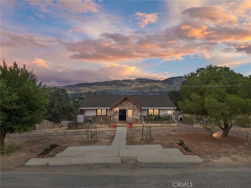Discover Tranquility and Versatility in This Unique Multi-Generational Retreat



If you're seeking peace, nature, and a strong sense of community, this home is your perfect match. Thoughtfully designed for comfort and flexibility, this two-level residence offers separate entrances—ideal for multi-generational living, rental income, or guest accommodations.



Main Level:



2 spacious bedrooms and 1 full bathroom



Bright and airy living room with beamed ceilings and a cozy fireplace



Abundant natural light and panoramic views of the valley



Updated, modern kitchen perfect for everyday living and entertaining



Lower Level:



Separate entrance for added privacy



1 bedroom and 1 full bathroom



Full kitchen and expansive family room with direct access to the yard



Built-in catio for your furry friends and outdoor enjoyment



Bonus Features:



Sale includes adjacent land at 19804 Hi Court (APN #289-200-02-00-9)—a generous 19,683 sq/ft lot



Zoning code E(2 1/2)R offers development potential for multiple units



Property sits above the serene Tom Sawyer Lake—a rare opportunity to live surrounded by nature's beauty



This is more than just a home; it’s a sanctuary. Whether you’re looking to settle in a peaceful environment, invest in future development, or create a space for extended family, this property has it all.



Don’t miss your chance to own a slice of paradise!