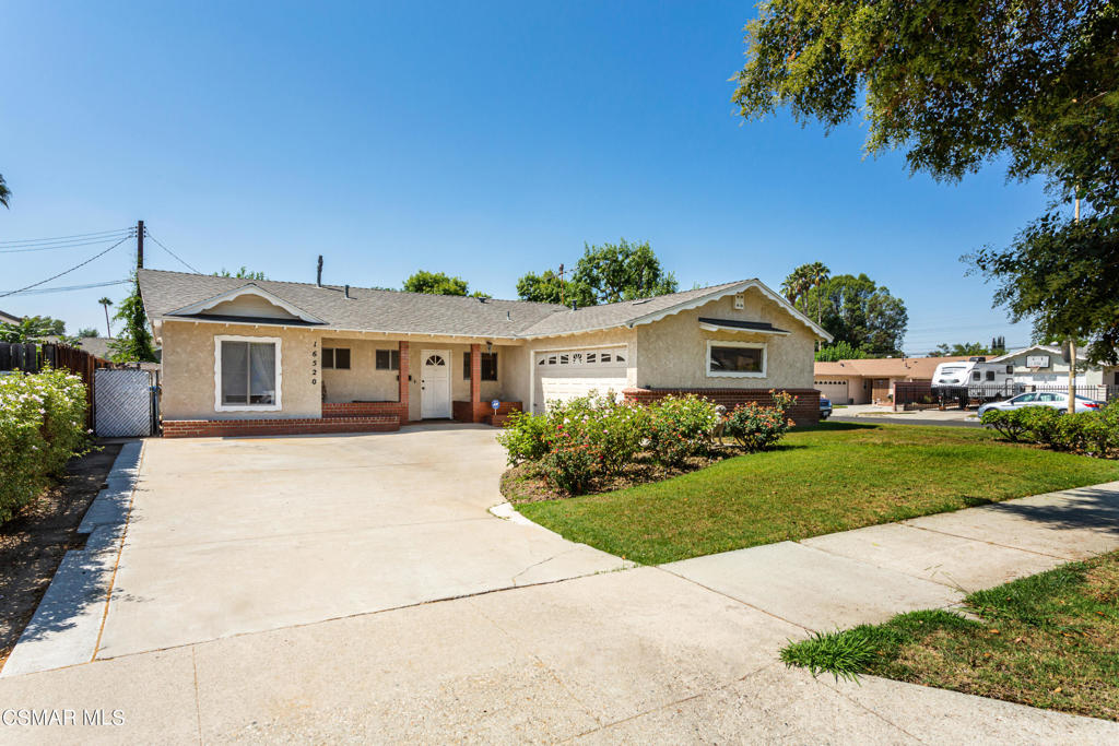A place to call HOME! Lovingly cared for North Hills West single story home located on a large corner lot with gated side RV access, a direct access 2 car garage and long driveway with lots of room for extra parking. This charmer features a Newer 3 year old roof, central air & heat, 3 bedrooms, 1.5 baths and 1,535 square feet of comfortable living space on an almost 7500 square foot lot. A spacious living room opens to a convenient family room with wet bar, and dual sliding glass doors leading to the relaxing rear yard with covered patio, mature shade tree and nice lawn area. The eat in kitchen offers tile flooring and counters, tons of cabinet space and lots of natural light. The master bedroom boasts a wardrobe closet and a private bathroom with built-in linen cabinets. Ample sized secondary bedrooms and there is a full hall bathroom. Additional amenities include security system, a beautiful rose garden, storage shed and located within minutes and easy access to freeways, CSUN, shopping, dining and more. It's a MUST SEE!