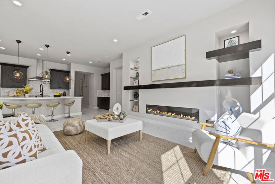 THE STERLING at West Hills. Custom built two story, "Venice" model in this highly coveted community. This elegant 5-bedroom, 6-bathroom home epitomizes the Southern California lifestyle with mud room off garage, walk-in pantry, gourmet chef's kitchen with built-ins opened to the bright family room with a stunning fireplace feature, dining room with retractable sliding doors providing indoor outdoor access to the backyard oasis with a sparkling pool/spa with Baja shelf, outdoor kitchen with built in grill and covered patio. Impressive primary bedroom is located downstairs with spa inspired bathroom; stand-alone large soaking tub, shower, dual vanity sinks and dual custom closets. Downstairs also perfect office / den at entrance of home. At the top of the staircase is a large great room for entertainment; playroom or additional living room. All four bedrooms upstairs have their own on suite bathrooms. Home has custom window treatments, soaring cathedral ceilings and owned solar system ready to be connected.  Bordered by preservation land, this home is a statement of modern luxury, designed for maximum privacy and serenity. This community is a collection of 143 Luxury Single Family homes and has a small park perfect for walking your pets and allowing them to leisurely explore.
