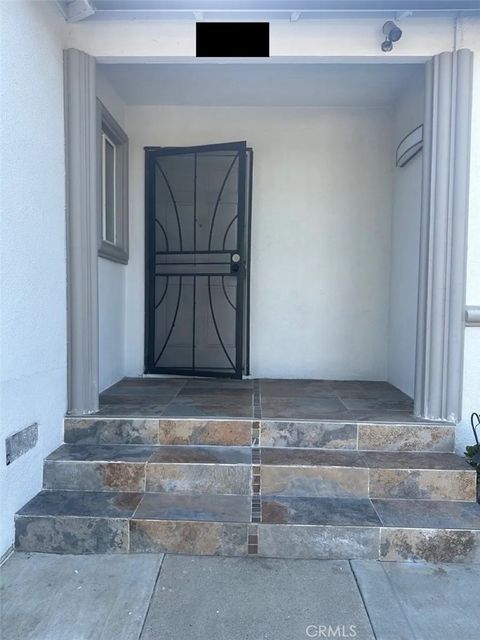 Photo of 9711 Hayvenhurst Ave, Northridge, CA 91343 (MLS # SR26048515)