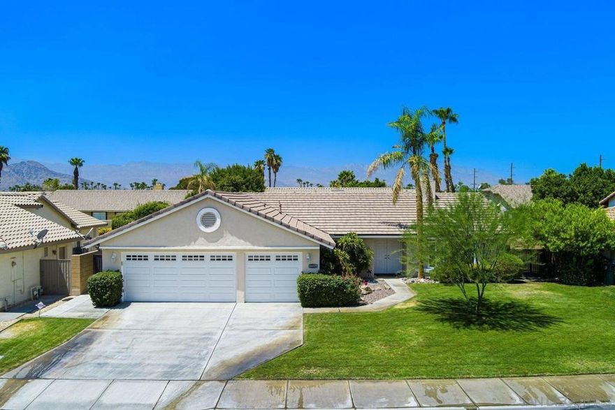 *Home is unfurnished* Owner will pay landscaping fee. Beautifully Updated Home in Highly Desirable North La Quinta - 3-bedroom, 2-bathroom home nestled in the sought-after Cactus Flower Development on a quiet cul-de-sac. Located within an award-winning school district. This move-in-ready property is 1,621 sq. ft. of stylish, open-concept living with low electric rates via Imperial Irrigation District (IID). Step inside to discover a fabulous floor plan; featuring a family room with a granite-surround gas fireplace, a spacious living room/dining area, and an upgraded kitchen with granite countertops, stainless steel appliances, and instant hot water. The home has been extensively updated with: all-new windows and sliders (2023), new garage door (2024), new roof (2024), newer HVAC system with smart thermostat and Mini-split A/C in garage (2024), Laminate and tile flooring throughout (with carpet in one bedroom). Granite counters and modern fixtures in both bathrooms. Enjoy the convenience of a three-car garage with drive-through RV access. Fully enclosed backyard featuring: block wall fencing, covered Aluma wood patio and side patio, multiple seating areas, and storage shed. Fabulous curb appeal, mature landscaping and new double entry doors. Close proximity to shopping. This home truly has it all! Don't miss out on this La Quinta gem.