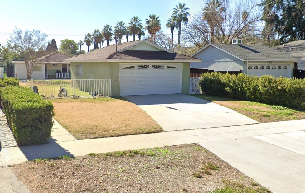GREAT AREA! This home has 2 detached garages, creating many possibilities. Much, Much potential!