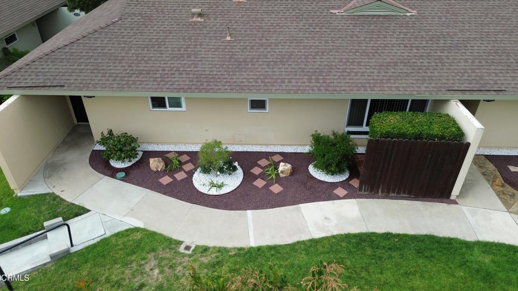 Rare single story condominium with only one attached wall. Freshly painted, newer luxury vinyl flooring, new stovetop and oven. Spacious living room area with fireplace. Large, private patio area. Two sparkling pools, clubhouse, spa, shared laundry, RV parking. Plenty of guest parking too. Enjoy living in this well-maintained community.