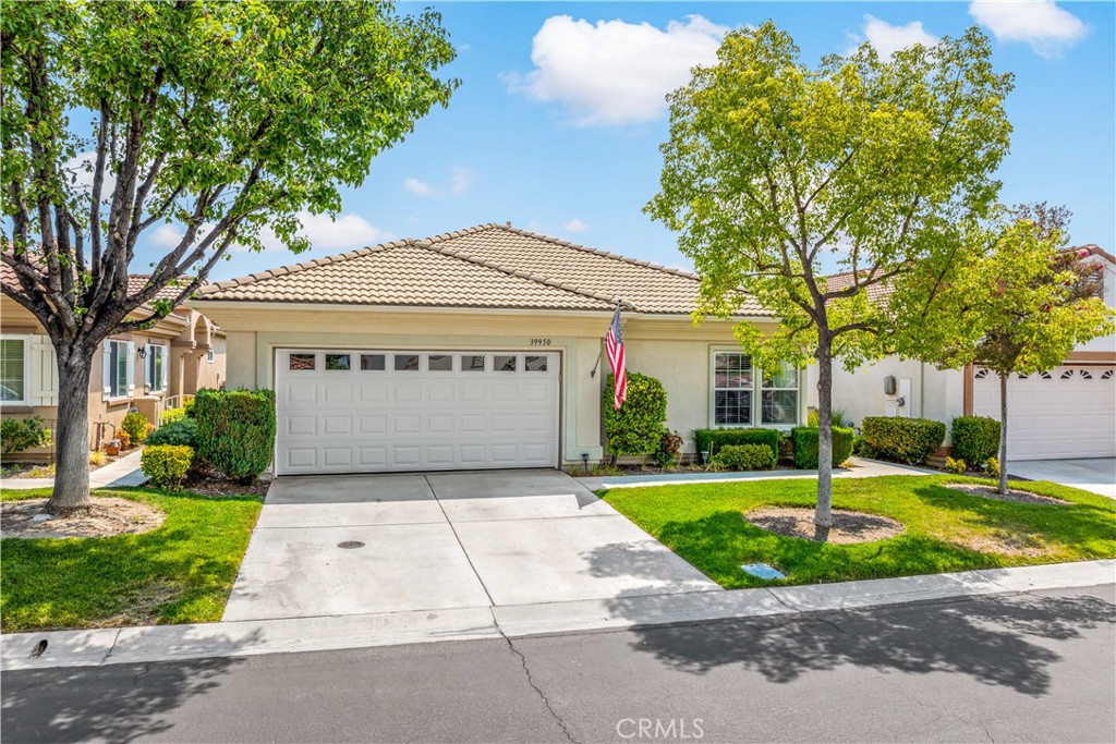 Welcome to the Colony! Enter an incredible resort-style community centrally located in the city of Murrieta. Enter the 24 hour guard-gated entrance and drive to this beautifully maintained 2010 sq ft, single story, 3 bedroom, 2 bath home located ideally on a quiet cul-de-sac. The courtyard leads to double-door access into a bright, light, airy large Great Room, with high ceilings, and an inviting view of the back yard with generous covered patio area overlooking the lush green open area beyond your fence. There are no neighbors behind you. The open concept floorplan has a formal dining area. The very functional kitchen has a dining area as well, an island, and plenty of storage and work space. The Master Bedroom suite enjoys access to the back patio and a large walk-in closet, and Master Bath with soaking tub and separate walk-in shower, 2sinks and a private commode. The other 2 bedrooms are on the other side of the house, where there is a second bathroom with walk-in shower. The laundry room has washer/dryer and sink, and plenty of cabinets. This premier gated community has so much to offer! There is an all-inclusive clubhouse boasting activities for so many interests, including, billiards, card games, a gym, a hair salon, dance classes, art classes and outdoor enthusiasts have a Gym, pickleball, tennis, golf and swimming, to name a few amenities. Great location close to shopping, restaurants, medical, banks, and more entertainment. You can be as Active or relaxed as you choose to be!