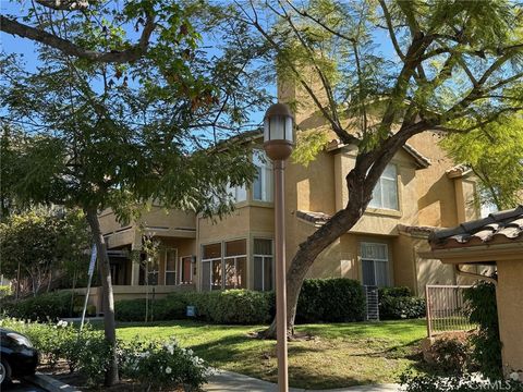 Photo of 19431 Rue De Valore #14A, Lake Forest, CA 92610 (MLS # PW26061352)