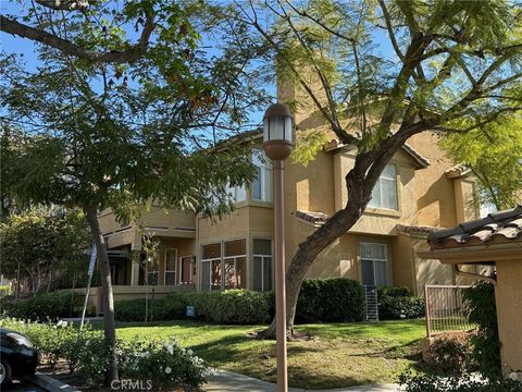 Photo of 19431 Rue De Valore #14A, Lake Forest, CA 92610 (MLS # PW26061352)
