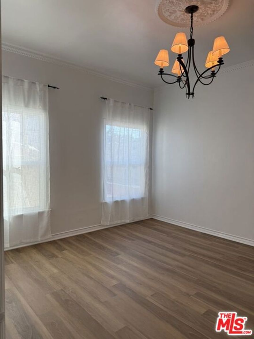 Discover this charming upper-level unit in prime Beverly Hills location. Spacious 1-bedroom, 1-bath with abundant natural light, fully remodeled interior, and modern kitchen with stainless steel appliances. Features newly installed mini-split A/C system, on-site laundry, and one assigned parking space. Close to luxury shopping and top restaurants. Video walk-thru available upon request.
