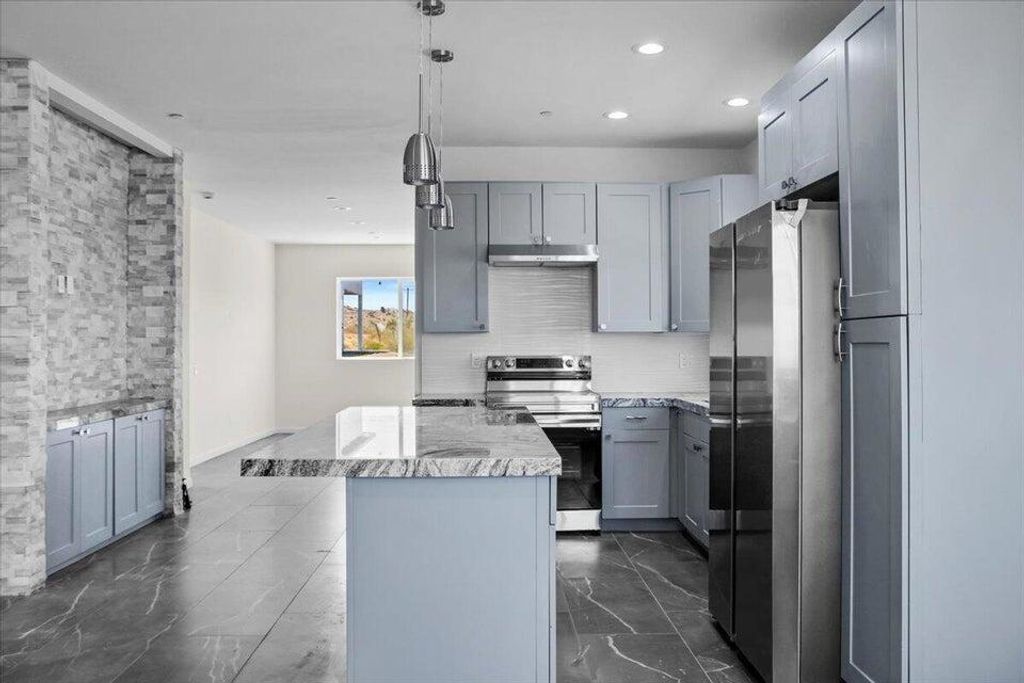 Photo of 7608 Olympic Road, Joshua Tree, CA 92252 (MLS # 219143049DA)