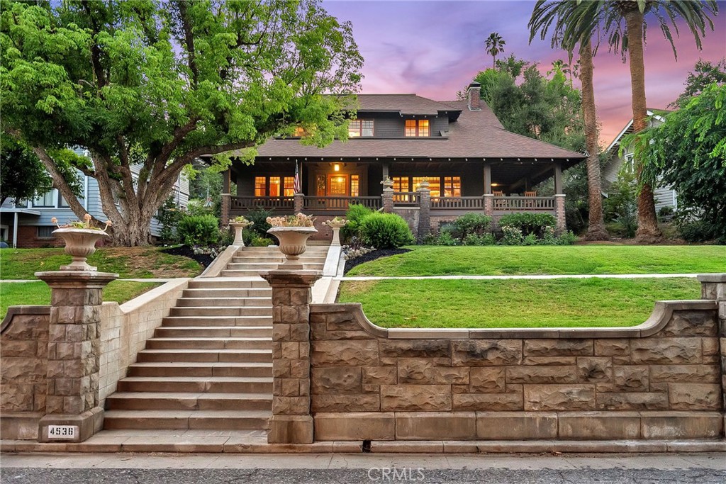 Elevated on the eastern slope of Little Rubidoux, this quintessential California Craftsman sits proudly among a collection of equally distinguished homes. Classic architectural details are proudly displayed, from clinker-brick masonry and weatherboard siding to a deep wraparound shade porch and multi-light casement windows. The interior is as a Craftsman should be. Comfortable and welcoming, spacious and yet not wasteful of space.The living and dining rooms are particularly striking, thoughtfully designed and beautifully preserved over the years. There are 4 bedrooms, one down and three up as well as an additional upstairs room and attached to the primary bedroom is a gorgeous, enclosed sleeping porch; a reminder of the home’s history and adaptability. The kitchen and breakfast room overlook a serene garden retreat, complete with mature citrus trees offering shade and delicious oranges which brought fame to Riverside in those early years of development. This home is just minutes from the trails of Mount Rubidoux, the Lakes and Fairmount Park and the excitement of Downtown Riverside’s central core. It’s also a district contributor to the Mount Rubidoux Historic District which is a neighborhood that is nothing short of stunning.