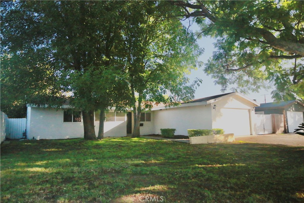 "This beautifully remodeled home features an open floor plan, a stunning remodel kitchen, and three spacious bedrooms with two updated bathrooms. Enjoy the brand-new flooring throughout, beautiful marble decoration around the cozy fireplace, and elegant recessed lighting that brightens every room. Step outside to a private backyard with mature trees — perfect for relaxing or entertaining. Located in a quiet neighborhood close to shopping, dining, schools, and public transportation, this home offers the perfect blend of style, comfort, and convenience!"