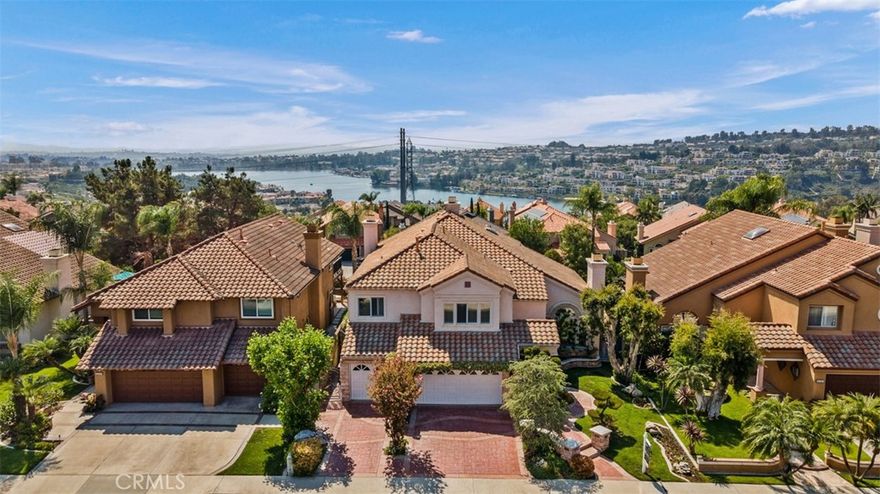 EXECUTIVE 3243 SQFT CANYON CREST HOME PERCHED HIGH ON A HILL W/BEAUTIFUL VIEWS OF THE CITY LIGHTS, HILLS & LAKE MISSION VIEJO! AN EXCELLENT LOCATION ON A CUL-DE-SAC STREET BACKING TO COMMUNITY DOWNHILL SLOPE. PROFESSIONALLY LANDSCAPED GROUNDS! THE FLOOR PLAN IS OPEN & INVITING W/CATHEDRAL CEILINGS. THE DOWNSTAIRS CONSISTS OF A LARGE LR, FORMAL DR, SPACIOUS KITCHEN, FAMILY ROOM, LAUNDRY RM, FULL BATH & OFFICE (CONVERTED 4TH BR). A SPIRAL STAIRCASE LEADS UP TO THE LARGE MASTER SUITE W/FP & TALL CEILINGS. FRENCH SLIDING DOORS OPEN TO A LARGE BALCONY W/SWEEPING VIEWS! THERE ARE TWO SECONDARY BEDROOMS W/JACK & JILL BATHROOM ALONG W/A SPACIOUS BONUS ROOM. THIS HOME HAS A LONG LIST OF QUALITY IMPROVEMENTS INCL NEW CARPET, MARBLE FLOOR, CUSTOM OFFICE & BONUS ROOM BUILT-INS, CUSTOM INTERIOR PAINT, DUAL WINDOWS & DOORS, GARAGE BUILT-INS & MUCH MORE! THE REAR PATIO & YARD ARE A PERFECT PLACE TO RELAX AND ENJOY! INCLUDES A BBQ W/BAR FOR THOSE FAMILY GATHERINGS! CANYON ESTATES OFFERS SOME OF THE VERY BEST COMMUNITY AMENITIES IN SOUTH ORANGE COUNTY, INCLUDING POOL, SPA, GYM, CLUBHOUSE, MEETING ROOM, EXCELLENT TENNIS, SPORT COURTS, CHILDRENS PLAY AREAS, BEAUTIFUL LUSH GROUNDS & MORE! INCLUDES MEMBERSHIP TO LAKE MISSION VIEJO W/BOATING, 2 BEACHES & WORLD CLASS FISHING!
