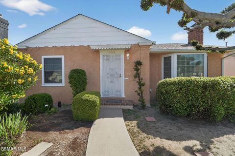 Photo of 3722 Degnan Boulevard, Los Angeles, CA 90018 (MLS # 226001095)