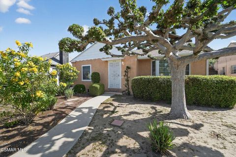Photo of 3722 Degnan Boulevard, Los Angeles, CA 90018 (MLS # 226001095)
