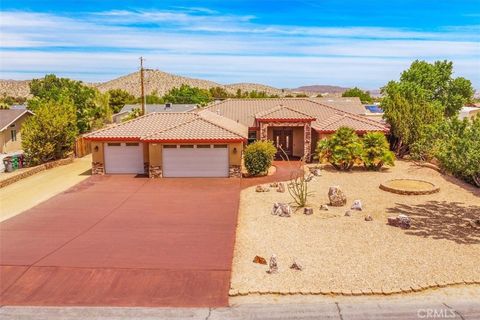 Photo of 57934 Juarez Drive, Yucca Valley, CA 92284 (MLS # JT25121781)