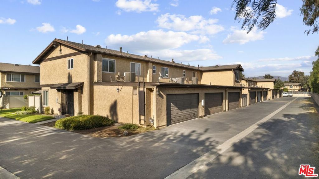 Welcome to this 2 bedroom, 2 bathroom condo in the vibrant heart of North Hollywood. Designed across two spacious levels, the home features recessed lighting, abundant natural light, and an inviting layout. The living and dining areas flow seamlessly to a gorgeous oversized balcony patio, perfect for morning coffee, evening gatherings, or simply enjoying the outdoors. Both bedrooms are generously sized with ample closet space, while the bathrooms are full sized and thoughtfully designed. The attached 2 car garage provides convenience and additional storage. Residents of this well maintained community enjoy access to a sparkling pool, tennis courts, and plenty of open space to relax and unwind. With its central location, this townhouse offers easy access to shopping, dining, entertainment, and major freeways, making it an ideal place to call home.