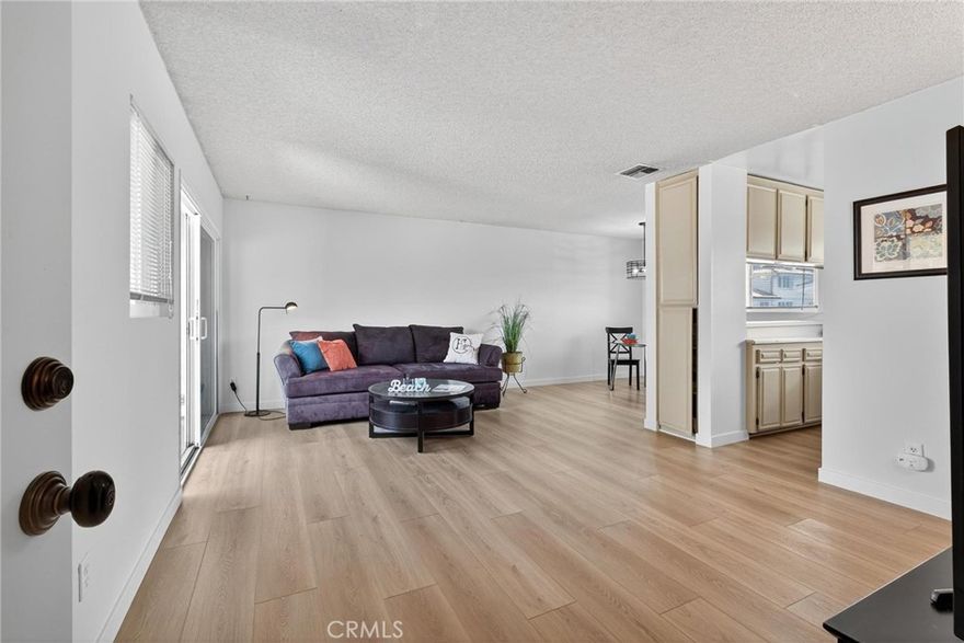 Live in the highly sought-after “The Avenues” and feel the Ocean breezes in this light and bright townhome located a couple of blocks from the beach, offering ocean peeks, a private deck, a spacious two-car garage with laundry, round skylights, lots of closets including a walk-in, a primary bedroom with ensuite bath, a dining area and an eat at counter. Recent updates include new LVP flooring, fresh paint, and newer double-pane windows. Nestled in a lush 12 unit garden setting with low hoa fees. This unit has a security door with stairs to the unit, once inside the townhome is all one level. Ideally situated near Riviera Village, popular restaurants, shops and award-winning Redondo schools. Appliances, washer and dryer, and furniture can be included upon request. Move right in to enjoy the coastal lifestyle, a view of Palos Verdes and beautiful sunsets!