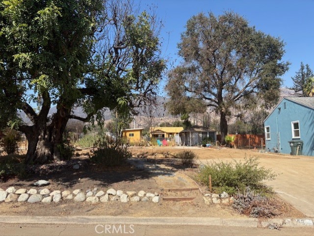 This flat parcel in prime Altadena presents an excellent opportunity to design a custom home with mountain views. An approximate 140 sq ft detached studio remains intact with 1/2 bath.The previous home was lost in the Eaton Fire. Phase 2 Debris Removal has been completed, the lot had access to all utilities before the fire. The original driveway and pavers still remain, adding a sense of character and charm. The sellers valued their time here, enjoying hikes, peaceful evenings, and the natural beauty of Altadena and its close-knit community. The property is being sold as-is, for land value only, but full of potential and ready for its next chapter.