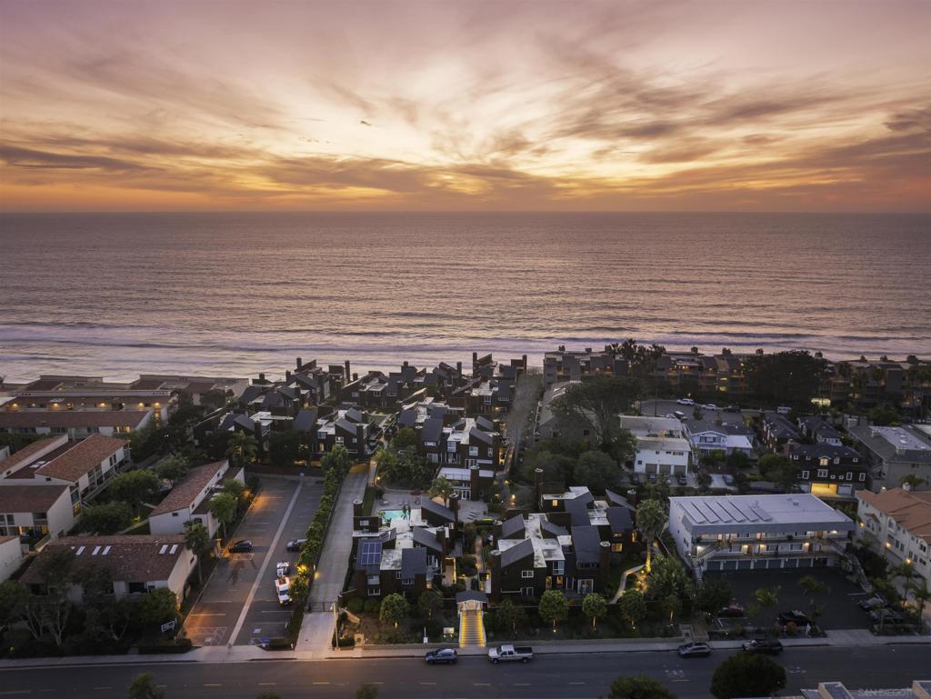 Welcome to this breathtaking, top-floor corner unit in an exclusive oceanfront complex, offering the perfect blend of tranquility, luxury, and modern style. With 2 spacious bedrooms and 2 beautifully updated bathrooms, this condo has been meticulously designed and upgraded between 2020-2025, showcasing quality materials and exquisite designer touches throughout. Boasting high ceilings that enhance the airy, open feel, this home is a true retreat. Every corner is thoughtfully crafted with premium finishes and a contemporary aesthetic, creating an inviting atmosphere you’ll love coming home to. The home’s location within a peaceful, park-like setting provides a serene escape, with sweeping ocean views and access to a variety of top-tier amenities including a sparkling pool, rejuvenating jacuzzi, and lush green spaces perfect for relaxation or outdoor gatherings. Beyond the gates, the vibrant neighborhood offers an unbeatable lifestyle, with trendy dining, entertainment, and recreational options just moments away. Whether you’re enjoying the breathtaking ocean views, lounging by the pool, or exploring the nearby hotspots, this condo offers the perfect mix of serene living and urban convenience. You won’t find a better location or a more stylish home. The ultimate oceanfront lifestyle awaits you!