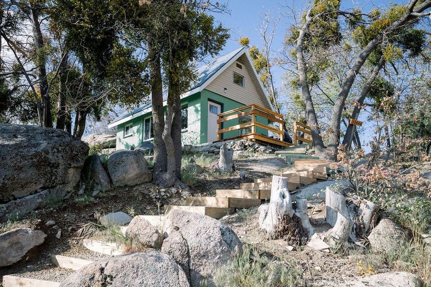 Active Airbnb tennants on weekends so please contact listing agent for showing times.



PRICE SLASHED – SELLER SAYS BRING ALL OFFERS!



Stop scrolling. Seller is serious, price is cut, and the call is simple: bring your offer.



Fully furnished and turn-key, this mountain retreat isn’t just cozy—it’s a proven income generator. In 2023 it brought in $28,636, and in 2024 it hit $29,238 in verified Airbnb rental income, based on just under 200 days of occupancy. Go ahead—book it more and cash in, or use it yourself for the perfect getaway the other half of the year. It’s a win-win. Reports are available.



Tucked among towering pines and granite boulders, this cabin blends rustic charm with modern comfort. Enjoy a lofted bedroom with classic cabin beams, an open-concept living and dining space with panoramic mountain and forest views, a private patio for entertaining, and a fully stocked move-in ready interior.



Minutes from hiking, dining, and year-round adventure, this property offers both privacy and immediate rental income potential. This isn’t just a cabin—it’s a lifestyle investment. Seller says: bring all offers.



Boom. Mic drop. Your move.