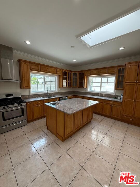 Gorgeous Second Main House in a Desirable Neighborhood. Nestled in a quiet and highly sought-after area, this beautiful home offers comfort, style, and convenience. The spacious kitchen features granite countertops, a large island, custom cabinetry, and a sunroof that fills the space with natural light. Newly remodeled bathrooms and crown molding throughout add elegance to the interior. Step outside to a charming sitting area, ideal for relaxing or entertaining, and enjoy the convenience of a long driveway with ample parking. Additional Details: Please do not disturb occupants of the front house. No garage space available. This is a wonderful opportunity to live in a peaceful, well-maintained neighborhood with easy access to shopping, dining, and more.
