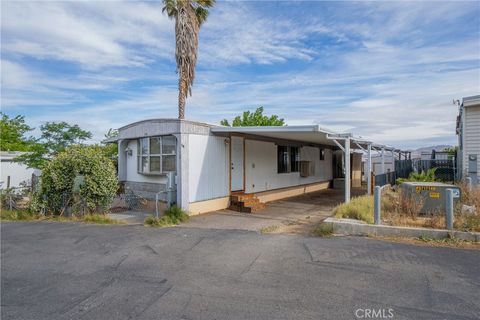 Photo of 15251 Village Drive #Spc 59, Victorville, CA 92394 (MLS # HD26091606)