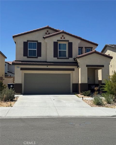 Photo of 12906 Echo Valley St, Victorville, CA 92392 (MLS # HD26093996)