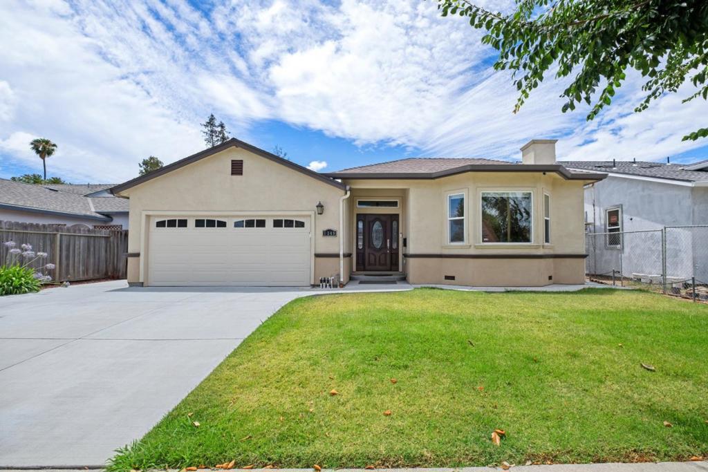 *Experience modern living at its finest in this stunning contemporary home, featuring a spacious backyard adorned with a fragrant white magnolia tree and two well-appointed master suites. Each suite comes complete with a walk-in closet, offering comfort, privacy, and flexibility. With a total of 4 bedrooms and 3 full bathrooms, this residence is ideal for families of all sizes. *Step inside to a bright, open layout enhanced by vaulted ceilings, double-pane windows, and a warm cherrywood front door. The inviting living room features a marble fireplace and a charming bay window, creating a space that is both cozy and refined. *The chef-inspired kitchen is a true highlight, offering marble countertops with a full backsplash, rich cherry cabinetry, and sleek stainless steel appliances. It flows seamlessly into a sunlit dining area, illuminated by recessed lighting and a skylight that fills the space with natural light. *Conveniently located near Costco, Ranch 99, H Mart, the Great Mall, Vinci Park Elementary (8/10 test score rating on GreatSchools), local parks, Berryessa BART, and major highways (680/880/101), this home offers easy access to top tech employers like Nvidia, Google, Apple, and Supermicro. It combines style, functionality, and exceptional convenience.