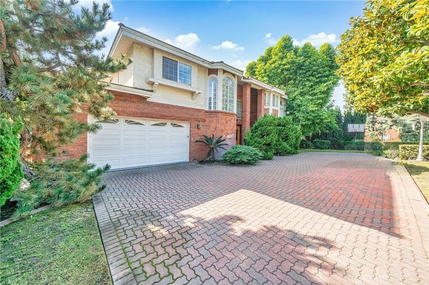 Beautiful custom home on a quiet cul-de-sac in prime Arcadia. Features soaring high ceilings, crystal chandeliers, and quality craftsmanship throughout. Includes two master suites, maple hardwood floors downstairs, and 100% wool carpet upstairs. The meticulously maintained backyard offers a resort-like setting with a koi pond, waterfalls, bonsai landscaping, and a large pool. Located in the award-winning Arcadia Unified School District and close to shops, dining, and parks. A must-see custom estate in excellent condition.