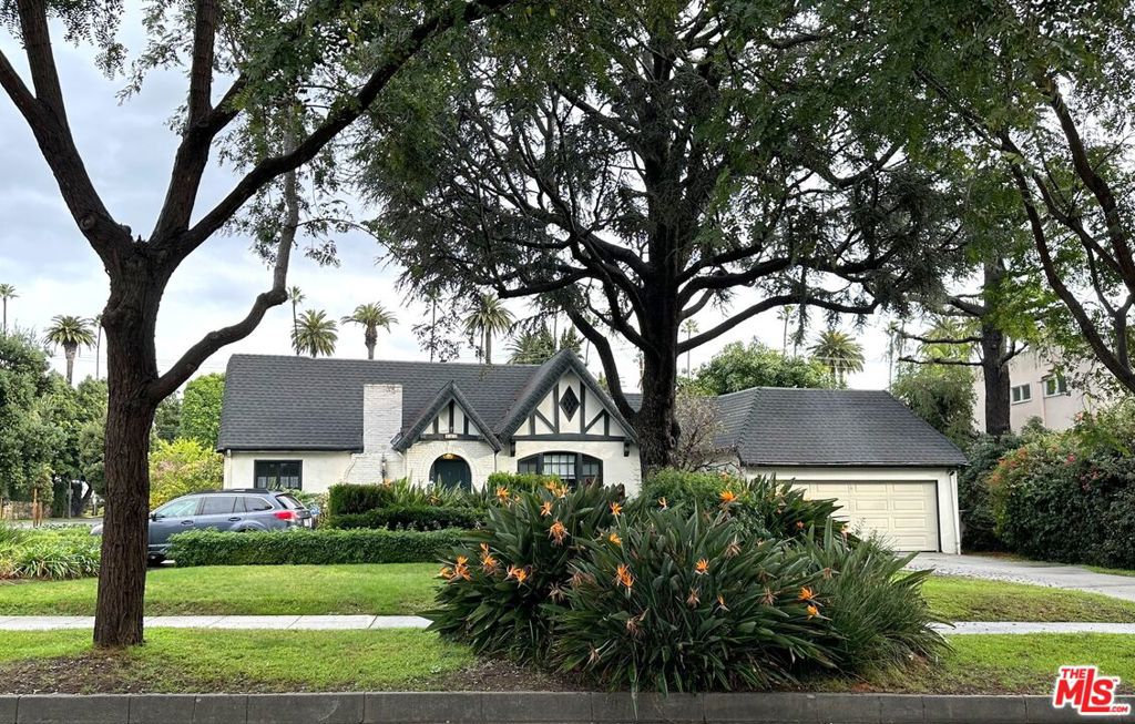 Attention: Investors, Flippers and would-be Beverly Hills homeowners. This is the corner lot you've been waiting for on a highly sought-after street in the west flats. Here's a chance to build a stunning dream home with everything you desire in a world-renowned community with excellent schools and highly-rated public services. The existing one-story home has been owned by two generations of family for the past 90 years and has not been updated. A unique feature allows driveway access off Roxbury and Elevado streets. The time has come to pass the dream on to someone else. Let your imagination be your guide.
