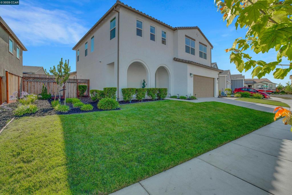 FHA ASSUMABLE LOAN, 2.75% TO QUALIFIED BUYERS AND APPROVAL FROM EXISTING LENDER!!! Located in Parkridge, The Hills - most commuter-friendly neighborhoods, minutes from Hwy 4, BART, Trader Joe’s, and Target, this sought-after Plan 4 features a contemporary open layout with vaulted cathedral ceilings and a downstairs junior suite with full bath. Over $150K in upgrades include 13-panel owned solar, custom stair railing, crown molding with ceiling beams, wainscoting wall accents, premium shutters, pantry with custom shelving, and more. Enjoy the electric fireplace with mantel, built-in TV, and custom bookcase in the loft—perfect for movie nights or relaxing. Thoughtfully designed with 2 sliding doors to the backyard (from both dining and living rooms), closet organizers, 220V car charger, and a landscaped yard with concrete patio, grass, pavers, and retaining wall. Just a short walk to the community park and scenic trails with breathtaking Mt. Diablo views. This is the most popular floor plan in the community—looks good and lives even better!