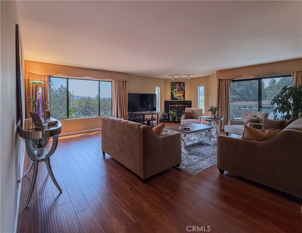 Located in the heart of Los Feliz, this bright 2-bedroom, 2-bath condo offers front-row views of the historic William Mulholland Memorial Fountain. Step inside to find an updated kitchen with modern finishes, perfect for both everyday living and entertaining. The spacious layout features a large dining room, an inviting living room, in-unit laundry and a private balcony where you can relax and take in the vibrant neighborhood scenery.
Enjoy the perfect blend of comfort, style, and location—just moments from Griffith Park, charming cafes, trendy shops, and all that Los Feliz has to offer.