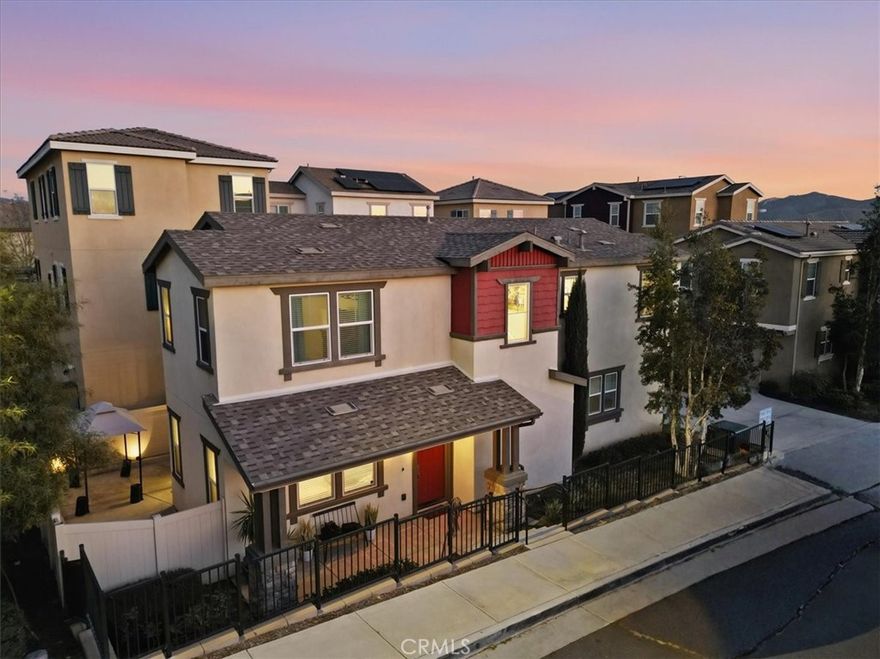 Welcome to 3972 Boulder Drive,  a beautifully maintained home located in the Granite Ridge gated community in Jurupa Valley! Offering 1,830 sq. ft. of living space, this 3-bedroom, 2.5-bath home includes a spacious open loft that can easily be converted into a 4th bedroom. Built in 2018, this home has all the modern finishes, upgrades, and systems of new construction. The kitchen offers ample storage with an open concept floor plan that flows into the dining and living spaces. A convenient powder room downstairs provides easy access for guests while entertaining. Upstairs, the primary suite features dual sinks, water closet, separate shower and bathtub, plus a walk-in closet. The loft, just outside the primary bedroom, can be utilized as an upstairs family room, toy room, or office. A dedicated laundry room and utility sink are also located upstairs. Additional features include an attached two-car garage, tankless water heater, electrical panel capable of solar panel installation, and a low-maintenance backyard. Though classified as a Condo, this fully detached home lives like a single-family residence. Community amenities include two playgrounds, gated entry, and HOA maintained landscaping. Conveniently located near the 60 freeway, the new Shops at Jurupa Valley, schools, and more!