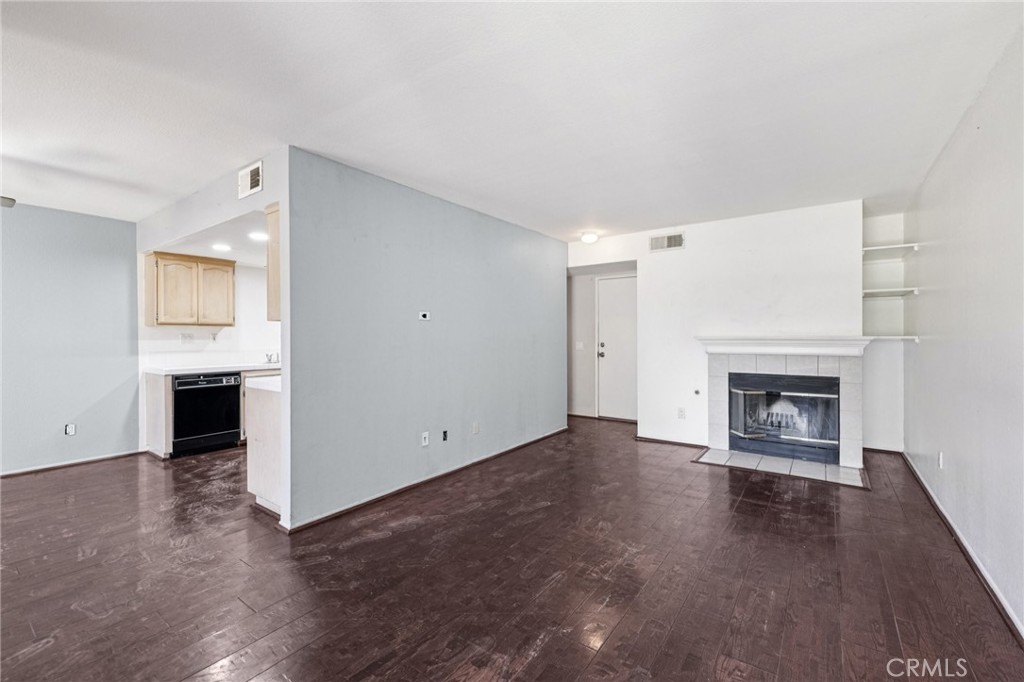 Wow!!! VACANT AND PRICED BELOW MARKET VALUE!!! Don't miss this opportunity!!! 1832 E Avenue J2 #2 is the lowest-priced 2-bedroom, 3-bath townhome currently for sale in the gated Desert Hills community — by a wide margin. While similar units nearby are listed for $280K–$295K, this gem shines at under $250K, making it a rare find in Lancaster’s most desirable pocket. Charming Two-Story Layout – Inviting open main level with a luminous living/dining area and a cozy fireplace. Bright, Comfortable Bedrooms – Upstairs features two peaceful bedrooms, a master with a NEWLY REMODELED ensuite, plus an additional full bath. Private Outdoor Spaces – A quaint covered patio for morning coffee, plus an upstairs balcony perfect for evening breezes. Convenient 2-Car Garage – Includes direct access and in-garage EV compatibility and in unit laundry hookups. Includes a pool view and tennis courts! Management is easy to work with!