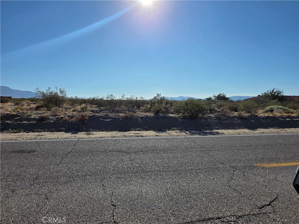 This 5 acre parcel is in an excellent location on paved road with power access. It's just a few minutes from the center of town, and 30 minutes from Big Bear. There are beautiful views of the mountains and desert all around. Priced right! Don't wait! Drive by and take a look.
(The address on this listing is not a county assigned address and is being used solely for the purpose of identification of this listing on the MLS and media.) Latitude 34.434071 Longitude 116.858418